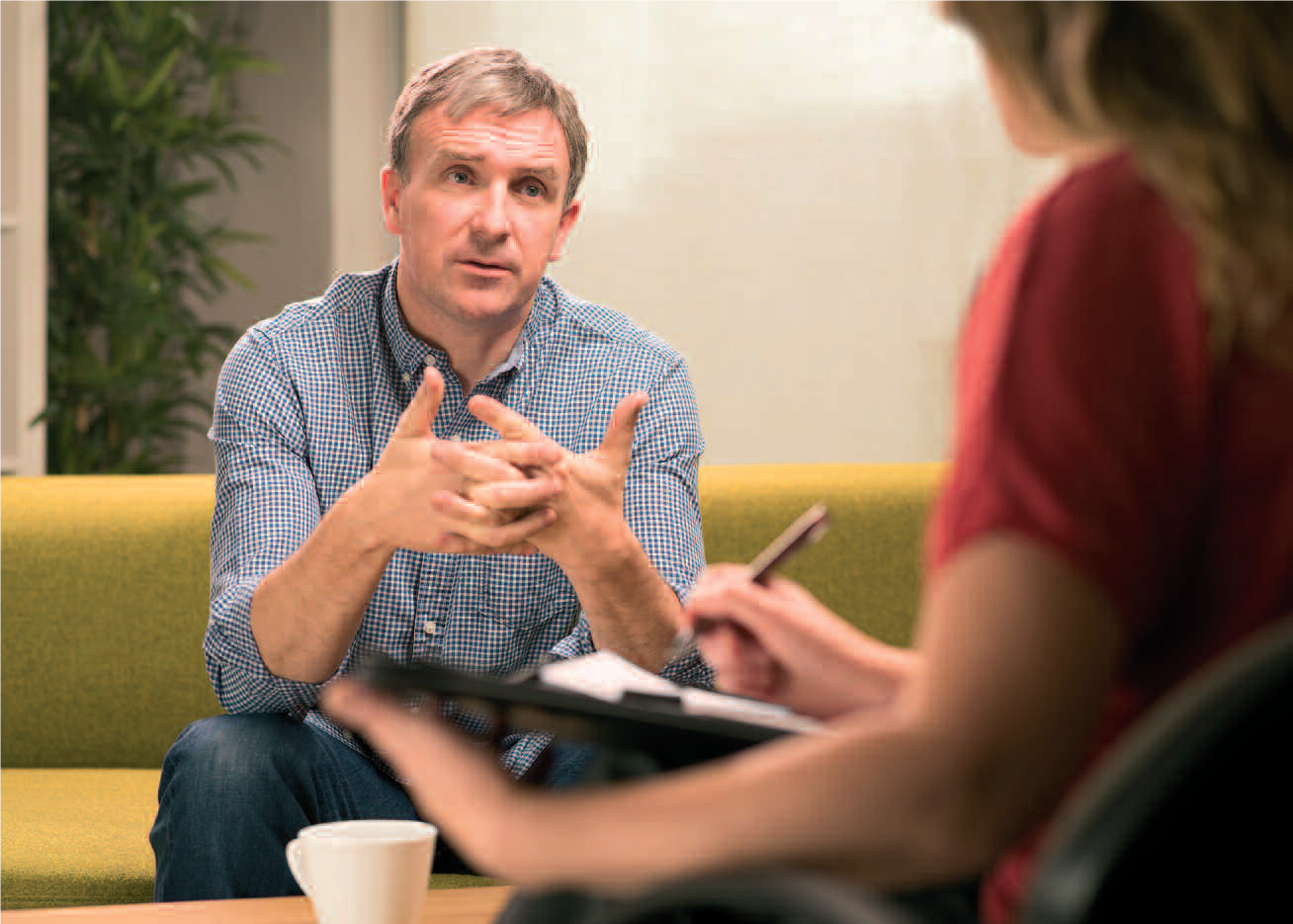 Man talking to a counsellor