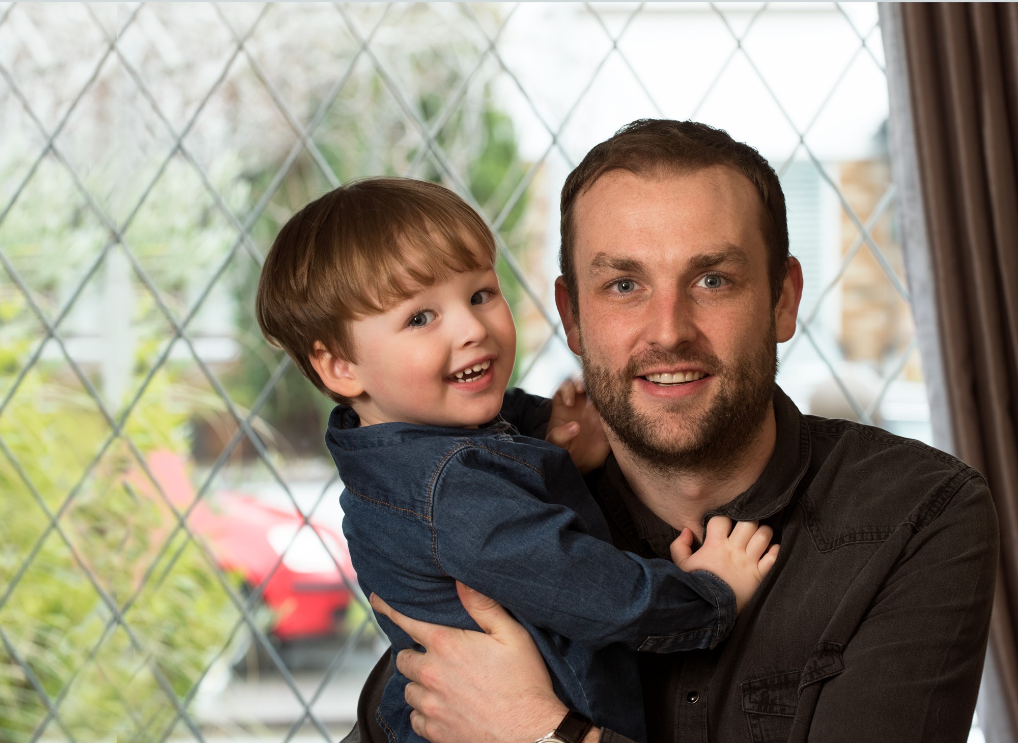 Cancer survivor Chris and his son