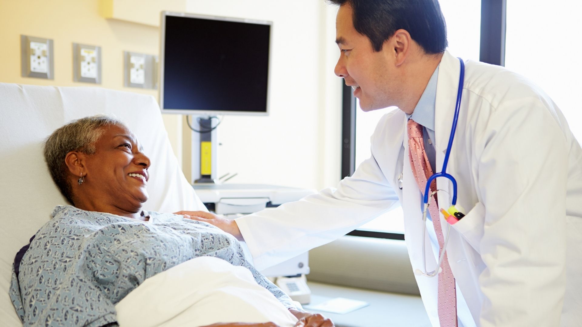 Woman in hospital bed