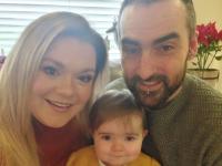 Jennifer with husband and daughter