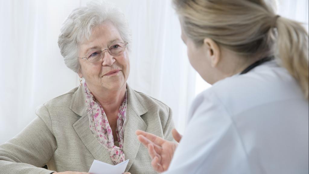 Older woman talking to her doctor