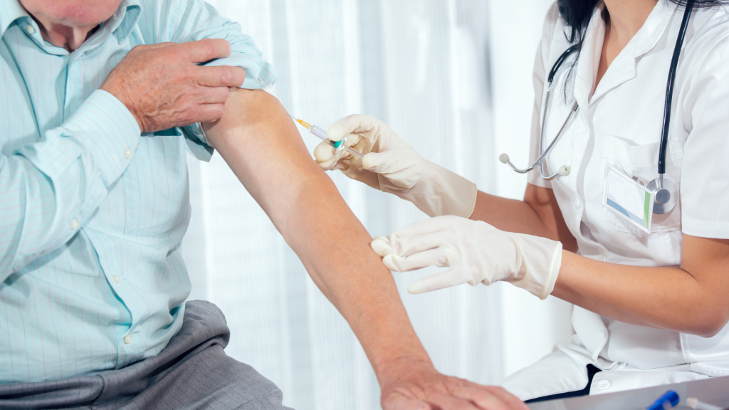 older man getting injection