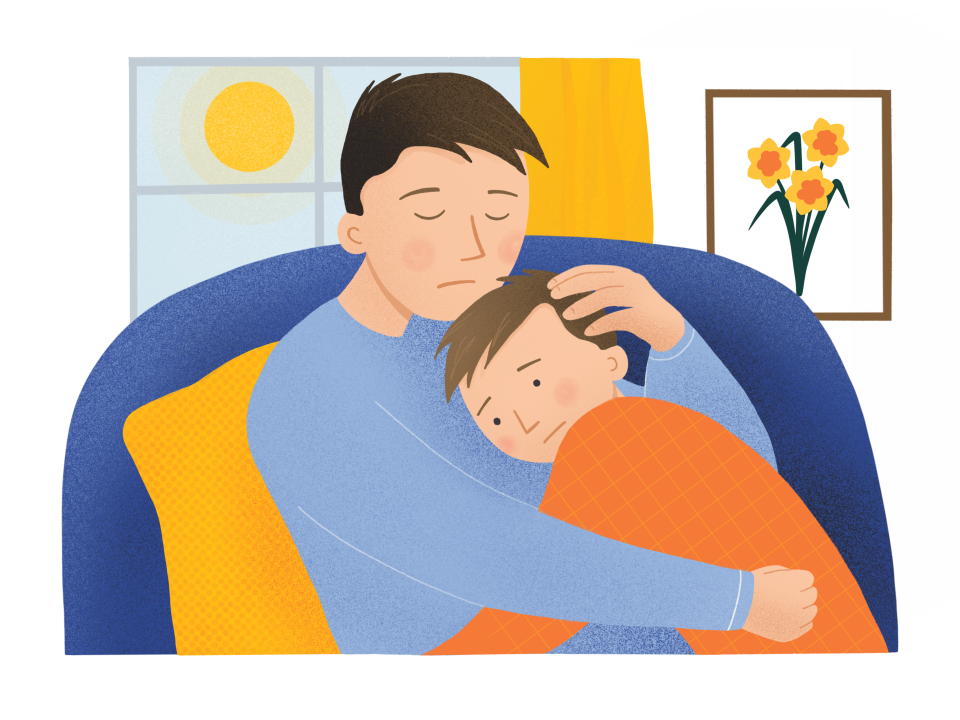 Father hugging son