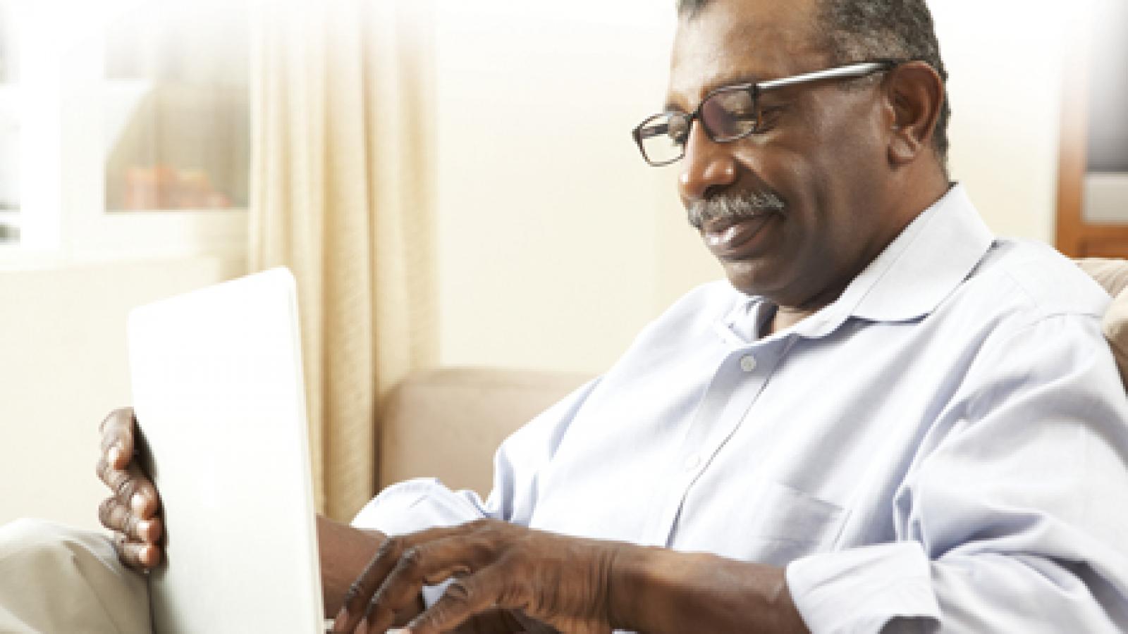 african man laptop