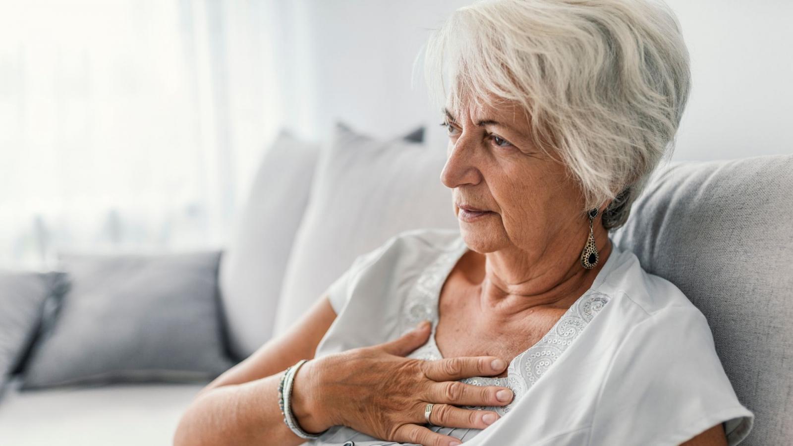 Woman with heartburn