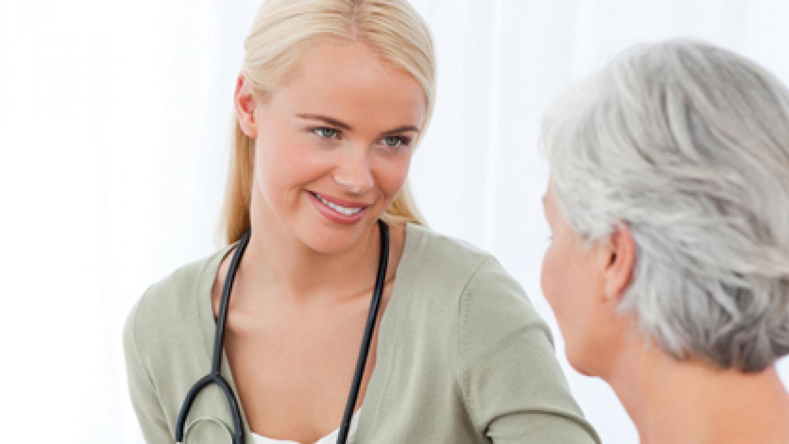Older woman talking to a doctor