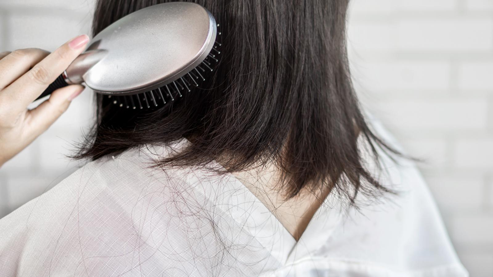 Woman brushing her hair