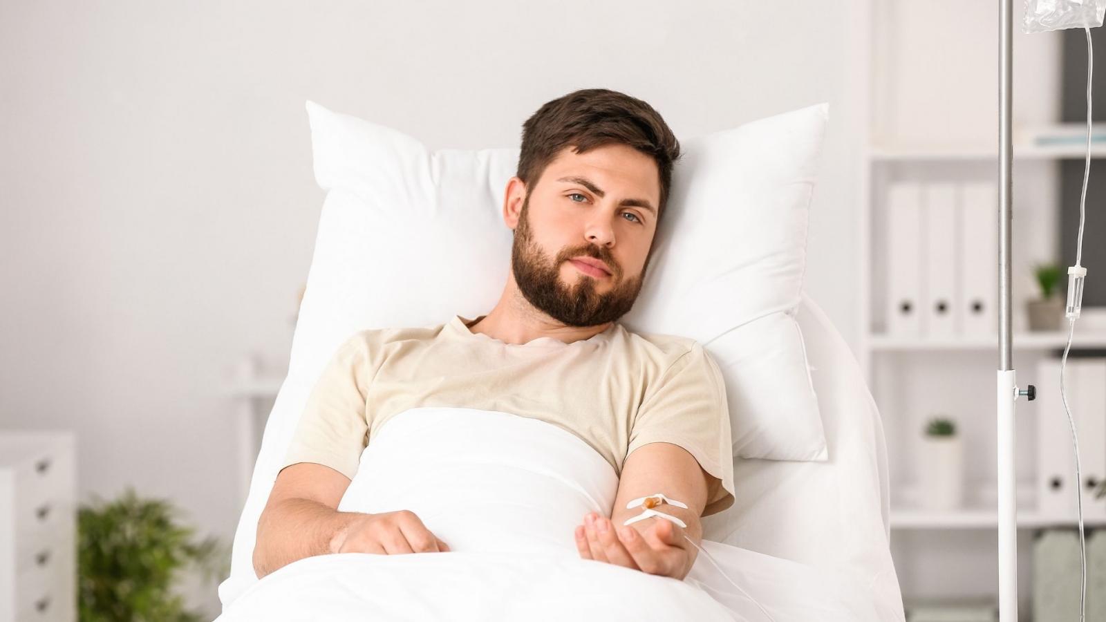 Young man in hospital bed