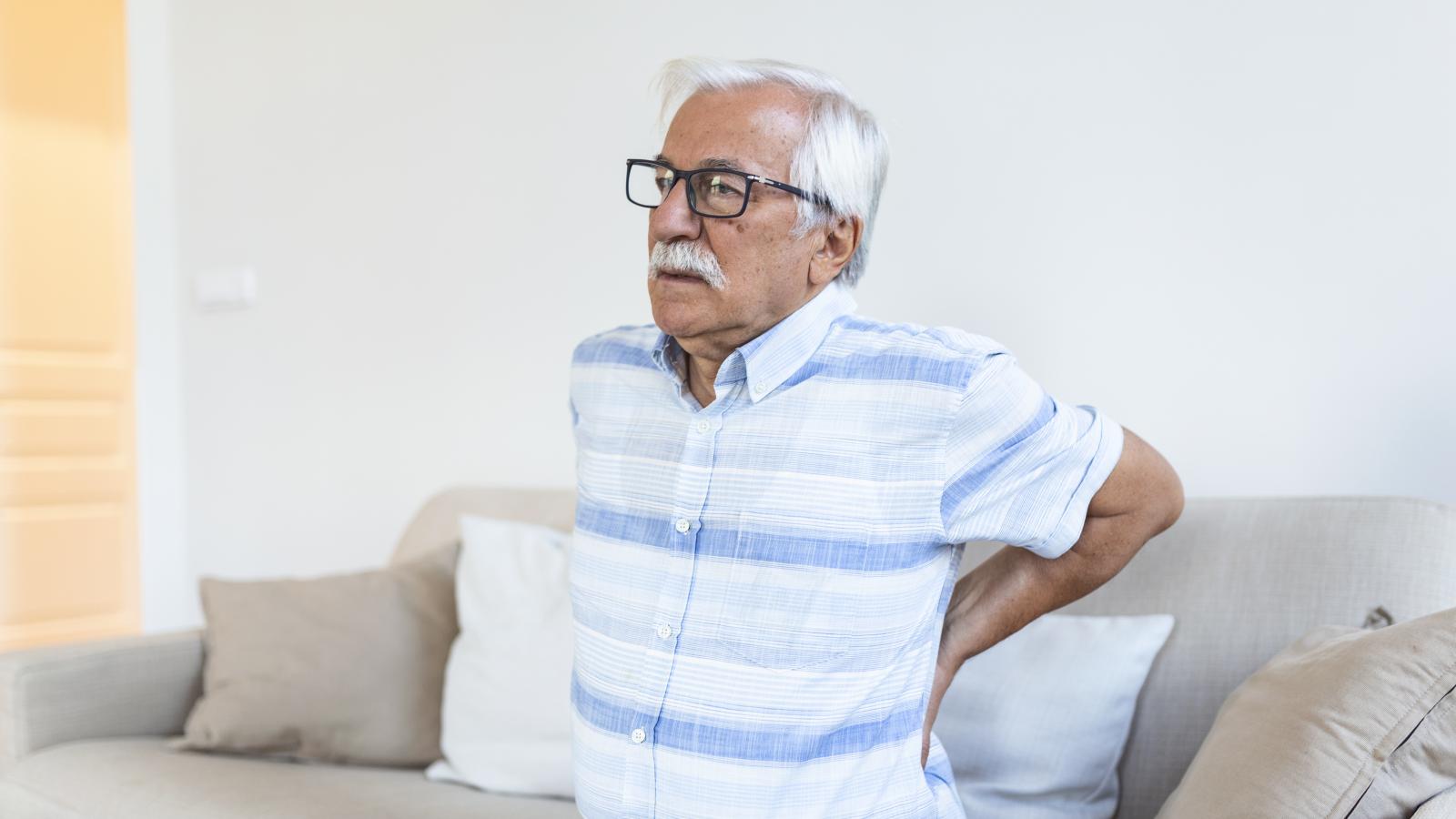 spine hernia older man back pain